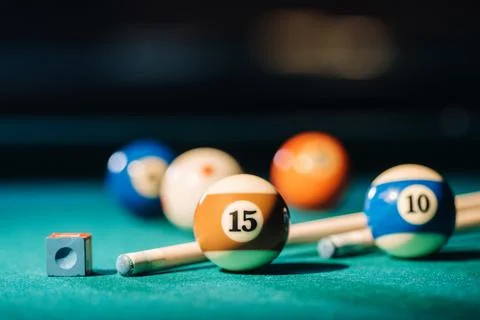Billiard table with green surface and balls in the billiard club.Pool Game 스톡 사진