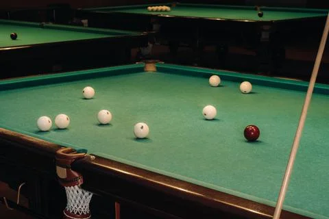 Billiard table with green surface and balls in the billiard club.Pool Game Stock Photos