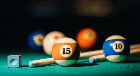 Billiard table with green surface and balls in the billiard club.Pool Game Stock Photos
