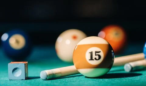 Billiard table with green surface and balls in the billiard club.Pool Game Foto stock