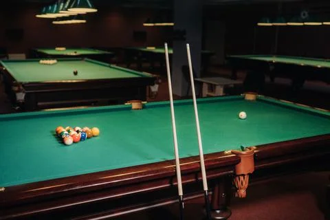 Billiard table with green surface and balls in the billiard club.Pool Game Foto stock