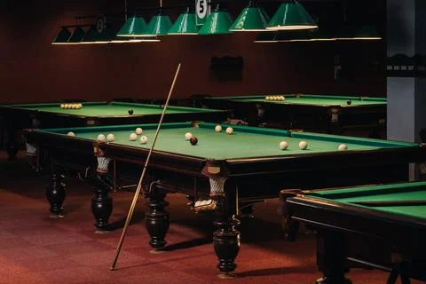 Billiard table with green surface and balls in the billiard club.Pool Game Stock Photos