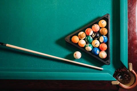 Billiard table with green surface and balls in the billiard club.Pool Game Stock-Fotos