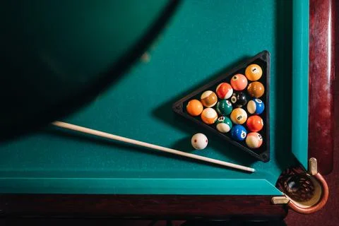 Billiard table with green surface and balls in the billiard club.Pool Game Stock Photos