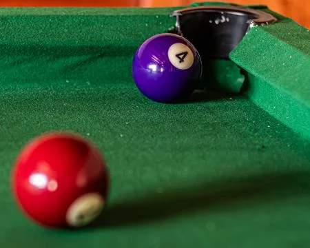 Billiard table setup featuring colorful pool balls, ready for an exciting g.. 写真素材
