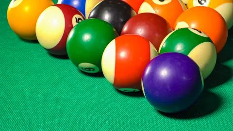 Billiard triangle on a green table Stock Photos