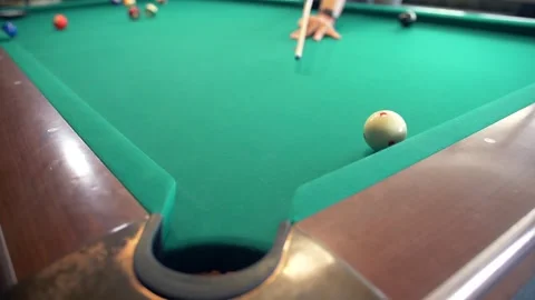 The billiards player scores the ball Stock Footage 154155553