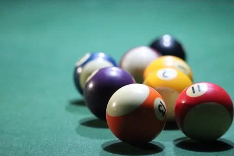 Billiards pool ball in the green board Stock Photos