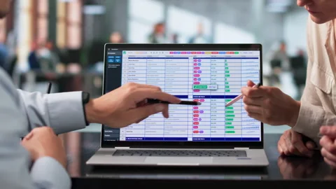 Billing Analyst And Team Reviewing Coding Spreadsheets Stock Footage 338169326