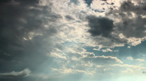 Billowing clouds and sunrays in the sky! - time lapse Stock Footage 41818580
