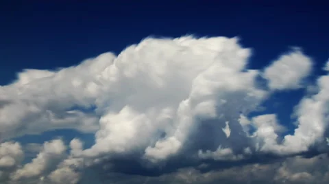 Billowing clouds in a blue sky. Stock Footage 52327219