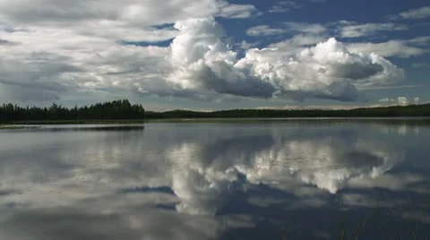 Billowing Clouds over Windy Lake Timelapse slower Stock Footage 11915144