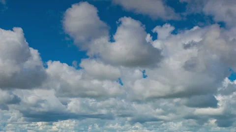 Billowing cumulus clouds Stock Footage 39075747