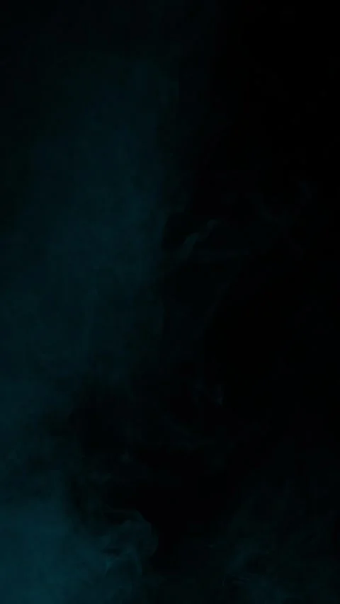 Billowing cyan smoke element on black background, vertical format Stock Footage 340144891