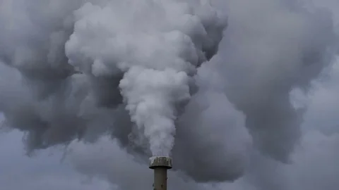 Billowing steam from smoke stack filling sky, super slow motion close up Stock Footage 78984425