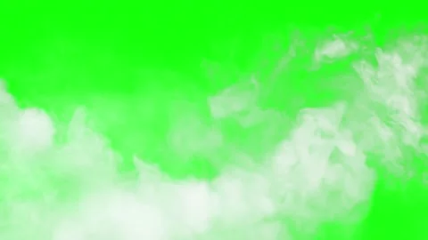 Billowing white smoke clouds flowing horizontally across bright green Video stock 340940494