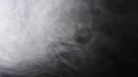 Billows of smoke slowly floating on the left side and disappearing on the top Stock Footage 81804259