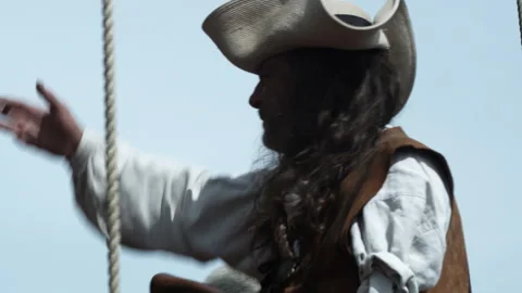 Billy One-Hand smoking on pirate ship, 1700s - Reenactment Stock-Footage 202896375