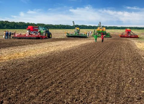 Bilogirya, Khmelnytsky region, UKRAINE - August 19, 2021: tractors with seede Stock Photos