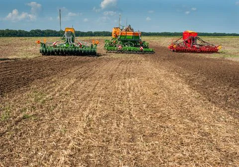 Bilogirya, Khmelnytsky region, UKRAINE - August 19, 2021: tractors with seede Stock Photos