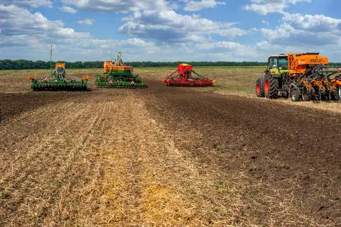 Bilogirya, Khmelnytsky region, UKRAINE - August 19, 2021: tractors with seede Stock Photos