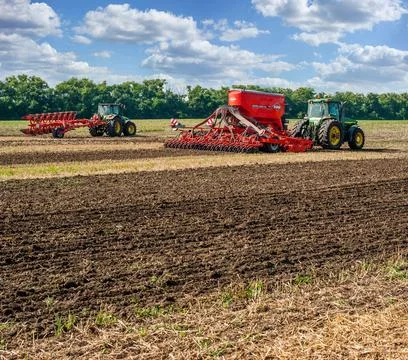 Bilogirya, Khmelnytsky region, UKRAINE - August 19, 2021: tractors with seede Stock Photos