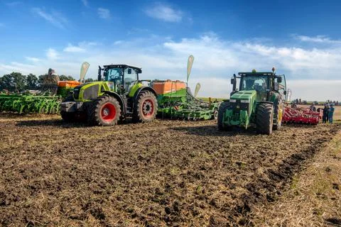 Bilogirya, Khmelnytsky region, UKRAINE - August 19, 2021: tractors with seede Stock Photos