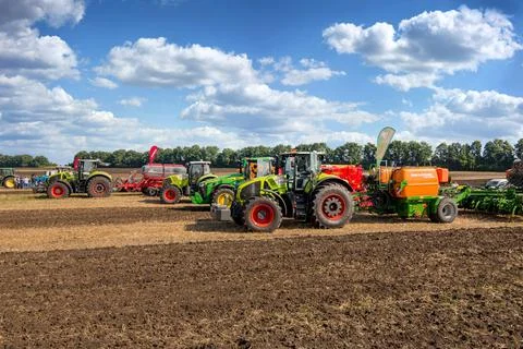 Bilogirya, Khmelnytsky region, UKRAINE - August 19, 2021: tractors with seede Stock Photos