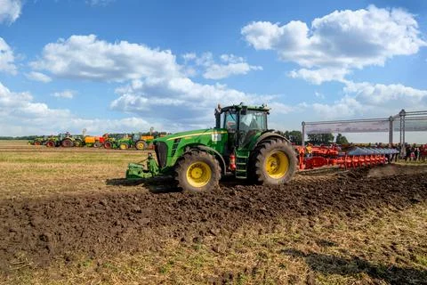 Bilogirya, Khmelnytsky region, UKRAINE - August 19, 2021: a tractor John Deer Stock Photos