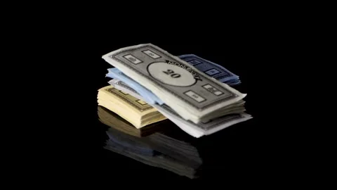 BILTEN - JANUARY 28, 2021, Monopoly money stacks falling on top of another. Vidéo 147375673