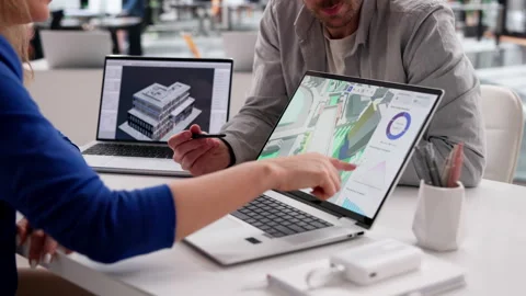 BIM Engineer Analyzing Urban Property Maps Stock Footage 332501362