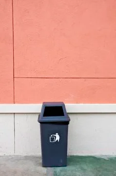 Bin and wall. Stock Photos