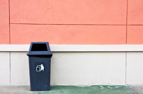 Bin and wall. Stock Photos