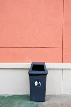 Bin and wall. Stock Photos
