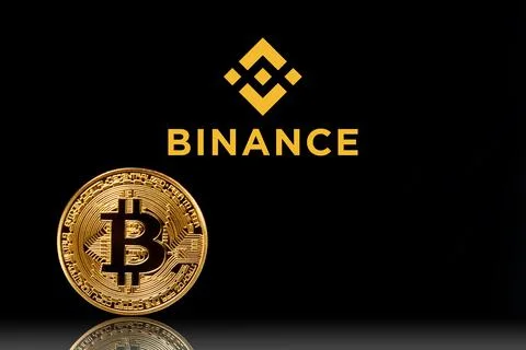 Binance logo with bitcoin on black background. Moscow, Russia - November 1, 2022 Stock Photos