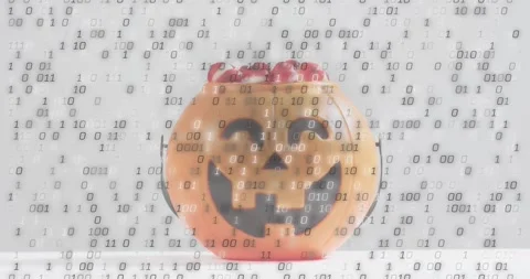 Binary bits drifting over orange pumpkin candy bucket intensifying digital rain Stock-Footage 328010963