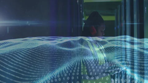 Binary code and digital wave animation over person working in data center Video stock 304860306