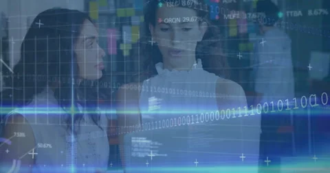 Binary code and financial data animation over two women discussing in office 動画素材 304014642