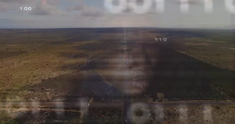 Binary code and human face animation over aerial view of vast landscape 動画素材 305900961