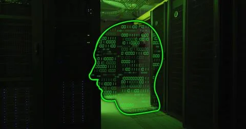 Binary code and human head image over data servers in dark room Foto stock