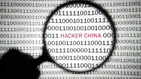 Binary code and inscription hacker China is detected with a magnifying glass. 스톡 동영상 149499651