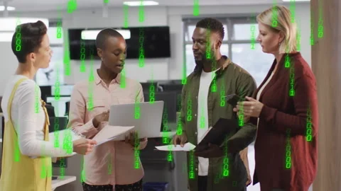 Binary code animation over diverse business team discussing documents in office Video stock 303792711