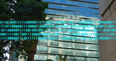 Binary code animation over modern glass building with trees in foreground Vídeos de archivo 326098055