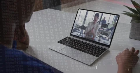 Binary code animation over person video conferencing on laptop in office 動画素材 328411271