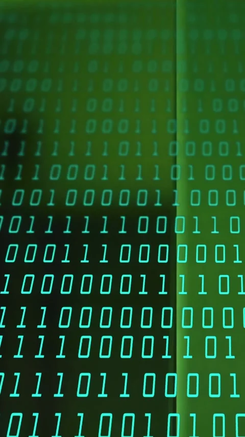 Binary code animation over shadowy figure in green background Stock Footage 343824365