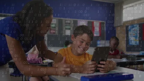 Binary code animation over students using tablets in school classroom Stock Footage 303685183