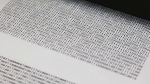 Binary Code Being Printed From Household Printer Video stock 73810632
