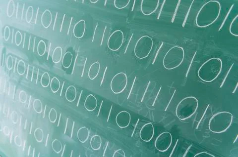 Binary code on blackboard 库存照片