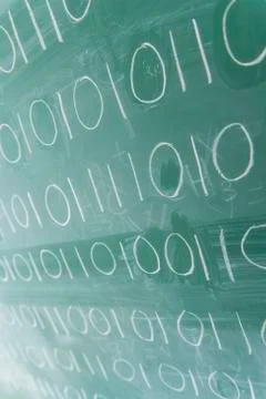 Binary code on blackboard Stock Photos
