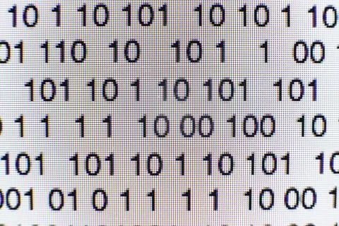 Binary code on a computer screen 스톡 사진